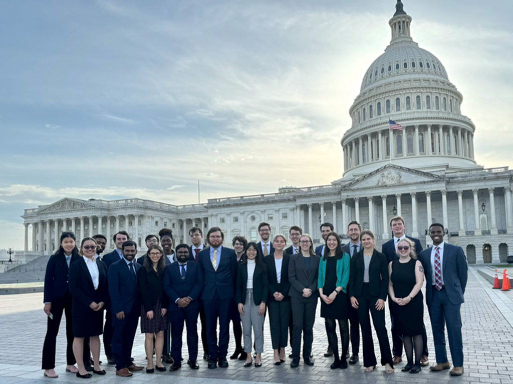 Congressional Visit Days participants pose in front of the U.S. Capitol.